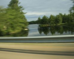 A beautiful northern lake seen from a speeding car