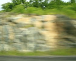 A beautiful northern rock cut as seen from a speeding car